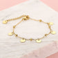 Bead bracelet with gold-colored coins