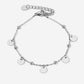 Silver-colored beaded bracelet with coins