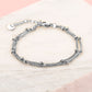 Bracelet with double silver-colored beads
