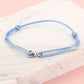 armband dubbele hartjes blauw zilverkleurig