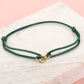 armband dubbele hartjes groen goudkleurig