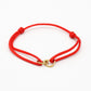 armband dubbele hartjes rood goudkleurig