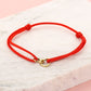 armband dubbele hartjes rood goudkleurig