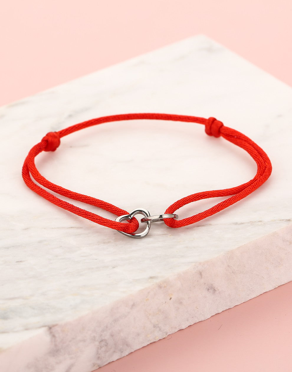 armband dubbele hartjes rood zilverkleurig