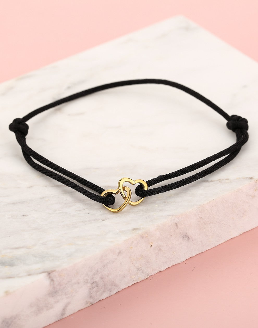 armband dubbele hartjes zwart goudkleurig