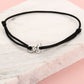 armband dubbele hartjes zwart zilverkleurig