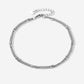 Ankle bracelet with double silver-colored beads