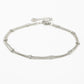 Ankle bracelet with double silver-colored beads