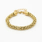 Armband cobra schakel goudkleurig