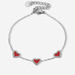 armband drie hartjes rood zilverkleurig