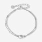 armband verbonden hartjes zilverkleurig