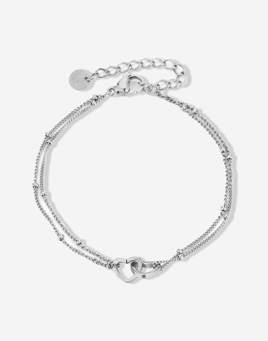 armband verbonden hartjes zilverkleurig