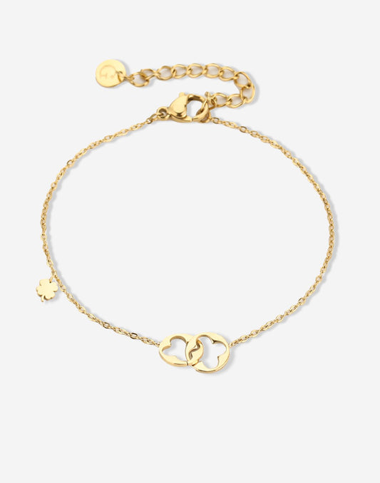 armband verbonden klavertjes goudkleurig