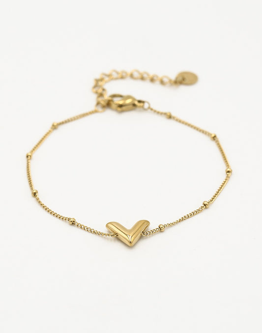 Armband V bolletjes goudkleurig