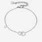 armband verbonden klavertjes zilverkleurig