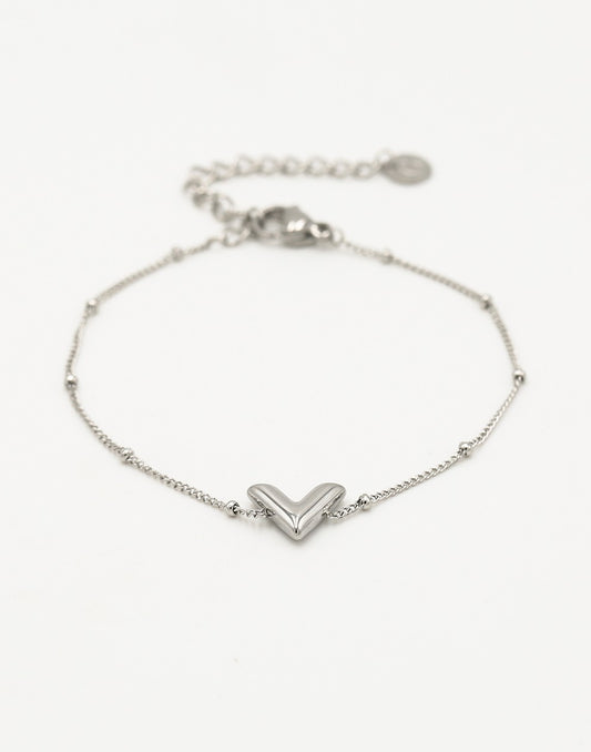 Armband V bolletjes zilverkleurig