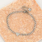 Schakelarmband met plat hartje zilverkleurig