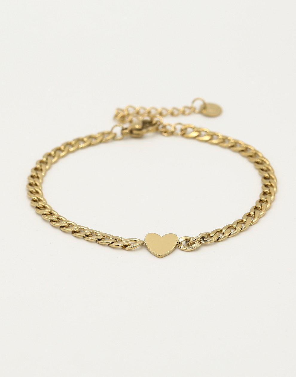 Schakelarmband met plat hartje goudkleurig