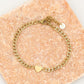 Schakelarmband met plat hartje goudkleurig