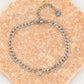 Schakelarmband met open hartje zilverkleurig