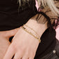 Armband muntjes en bolletjes chain goudkleurig