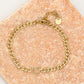Schakelarmband met open hartje goudkleurig