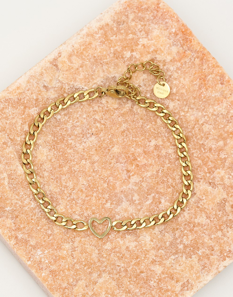 Schakelarmband met open hartje goudkleurig