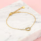 armband hartje strass goudkleurig
