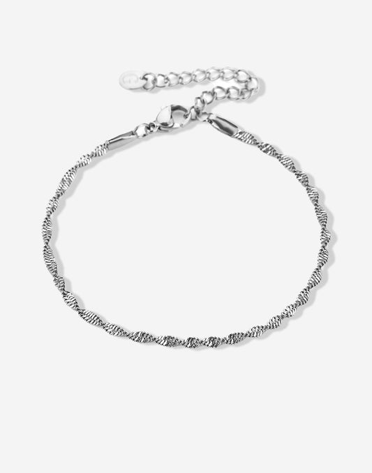 Gedraaide schakelarmband zilverkleurig