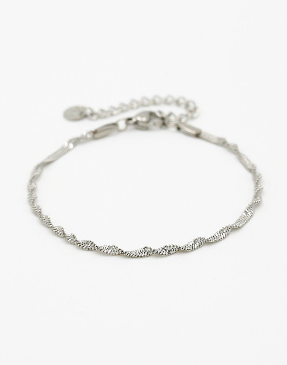 Gedraaide schakelarmband zilverkleurig