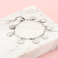 Armband muntjes zilverkleurig