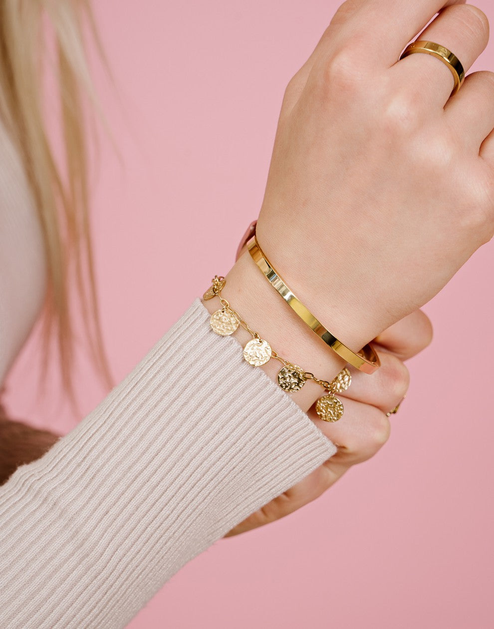 Armband muntjes goudkleurig