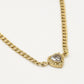 Fijne schakelketting hartje met steen goudkleurig