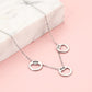 Ketting hartjes munten zilverkleurig