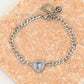 Fijne schakelarmband hartje met steen zilverkleurig