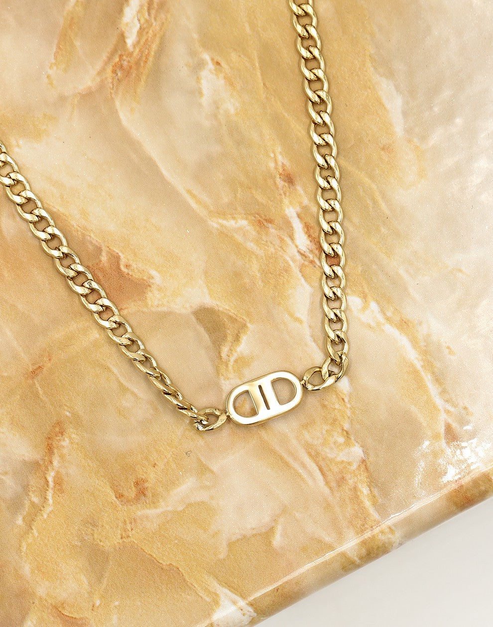 Schakelketting met symbool goudkleurig