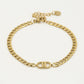 Schakelarmband met symbool goudkleurig