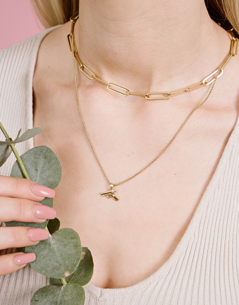 Pistool ketting goudkleurig