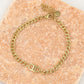 Schakelarmband met symbool goudkleurig