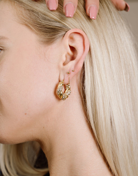 Oorringen gedraaide hoops strass goudkleurig