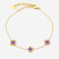 Armband klavers paars goudkleurig