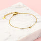 armband met steentje goudkleurig