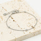 zilverkleurigen bolletjes armband