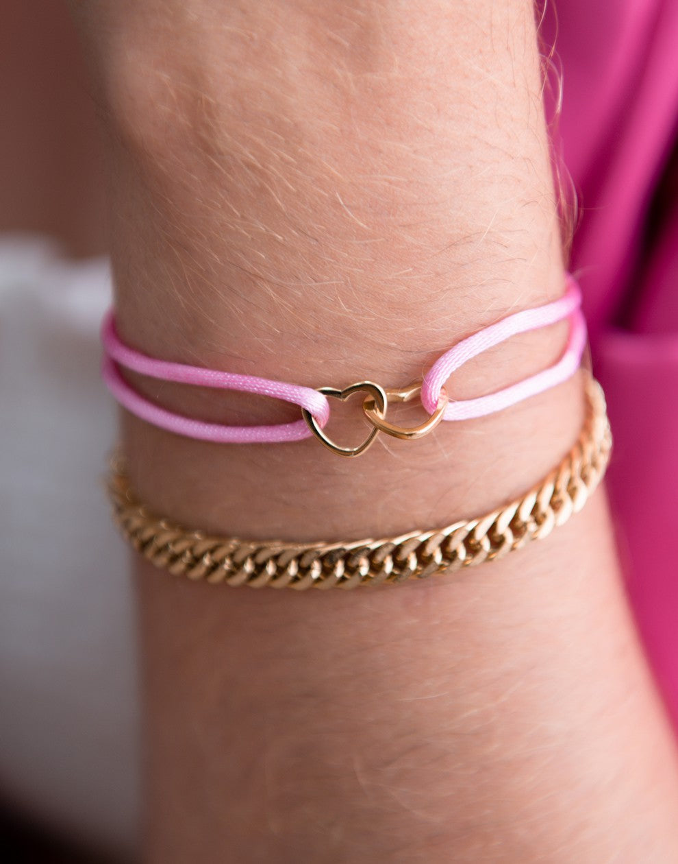 armband dubbele hartjes roze goudkleurig