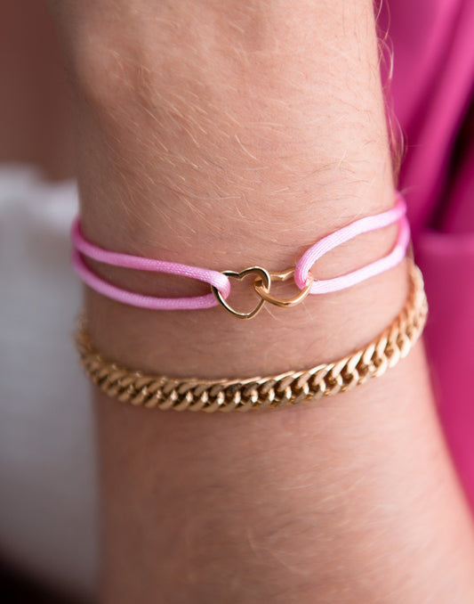 armband dubbele hartjes roze goudkleurig