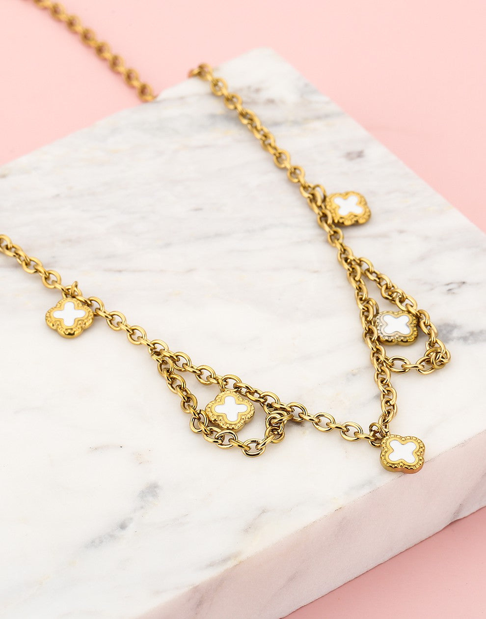 Schakelketting klavers wit goudkleurig