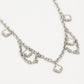 Schakelketting klavers wit zilverkleurig