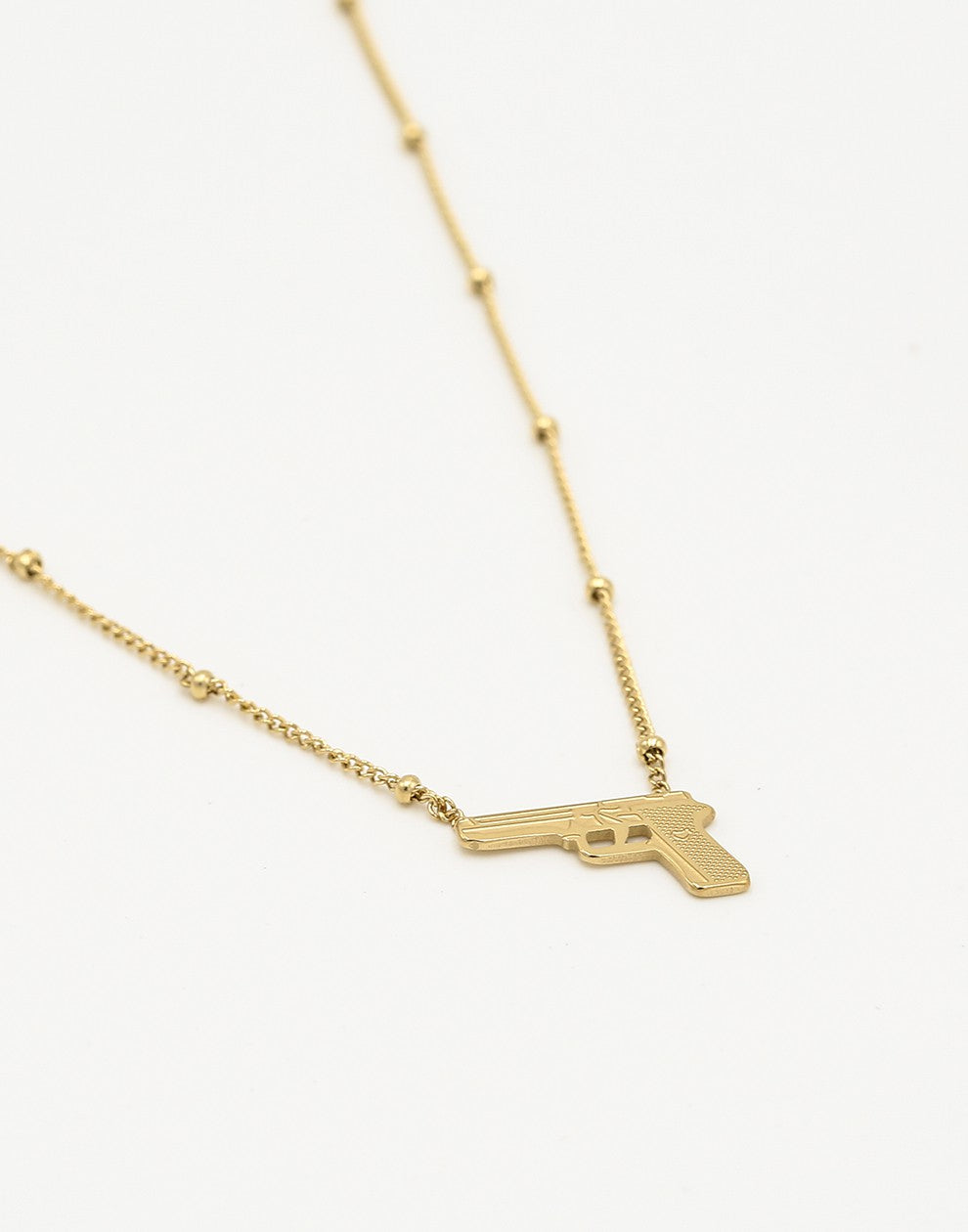 Balletjes ketting pistool goudkleurig