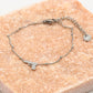 Armband pistool bolletjes schakel zilverkleurig