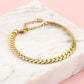 Platte schakelarmband goudkleurig